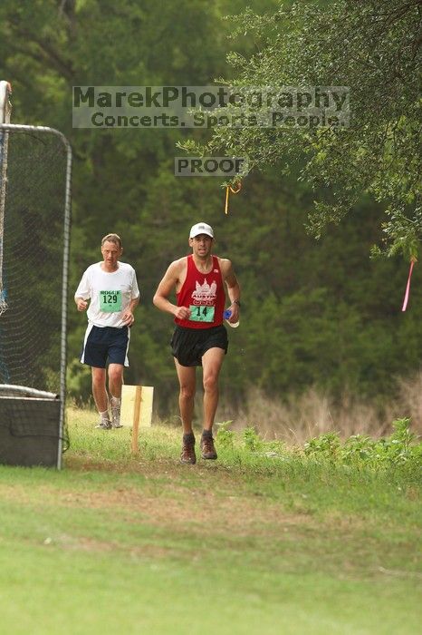 Paul Terranova  placed second overall in The Saint 30K trail race, sponsored by Rogue, at the Saint Stephen's Episcopal School on Sunday morning, June 29, 2008.

Filename: SRM_20080629_0909084.jpg
Aperture: f/4.0
Shutter Speed: 1/200
Body: Canon EOS 20D
Lens: Canon EF 300mm f/2.8 L IS