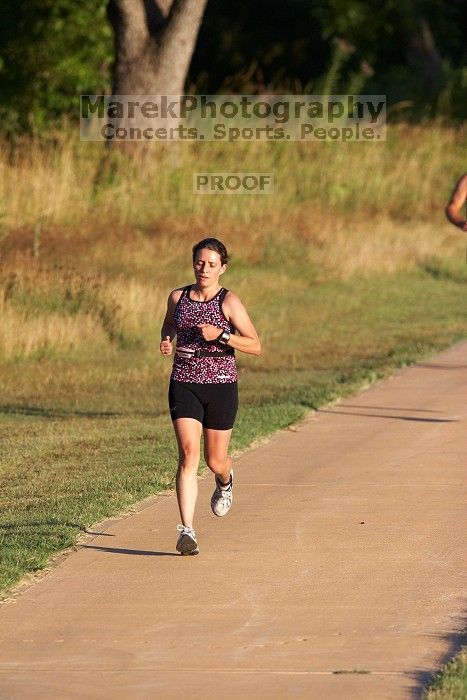 Beth Marek (bib #81) of Austin placed 4 in her age group (F 30-34) with an overall time of 01:46:51 at The Howdy Du duathlon in Berry Springs Park, Georgetown, Sunday July 6, 2008.

Filename: SRM_20080706_0730543.jpg
Aperture: f/4.0
Shutter Speed: 1/1600
Body: Canon EOS 20D
Lens: Canon EF 300mm f/2.8 L IS