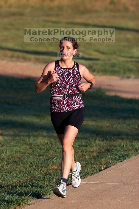 Beth Marek (bib #81) of Austin placed 4 in her age group (F 30-34) with an overall time of 01:46:51 at The Howdy Du duathlon in Berry Springs Park, Georgetown, Sunday July 6, 2008.

Filename: SRM_20080706_0731027.jpg
Aperture: f/4.0
Shutter Speed: 1/1000
Body: Canon EOS 20D
Lens: Canon EF 300mm f/2.8 L IS
