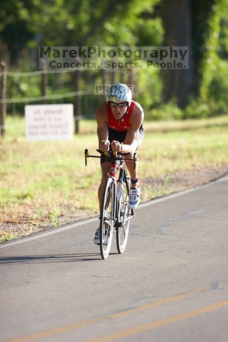 Derek Yorek (bib #128) of Austin placed 1 in his age group (M 25-29) with an overall time of 01:13:10 at The Howdy Du duathlon in Berry Springs Park, Georgetown, Sunday July 6, 2008.

Filename: SRM_20080706_0758100.jpg
Aperture: f/2.8
Shutter Speed: 1/800
Body: Canon EOS 20D
Lens: Canon EF 300mm f/2.8 L IS