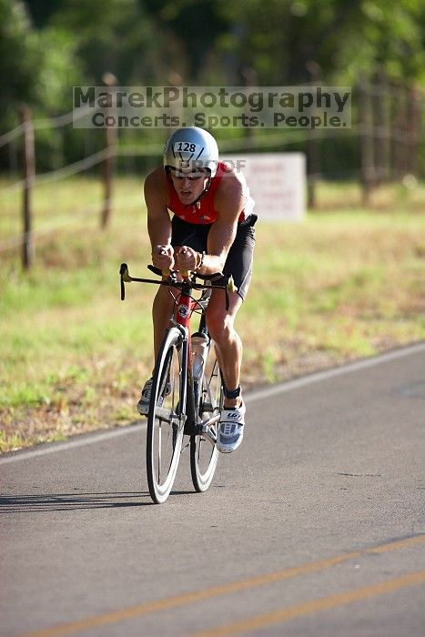 Derek Yorek (bib #128) of Austin placed 1 in his age group (M 25-29) with an overall time of 01:13:10 at The Howdy Du duathlon in Berry Springs Park, Georgetown, Sunday July 6, 2008.

Filename: SRM_20080706_0758142.jpg
Aperture: f/2.8
Shutter Speed: 1/1000
Body: Canon EOS 20D
Lens: Canon EF 300mm f/2.8 L IS