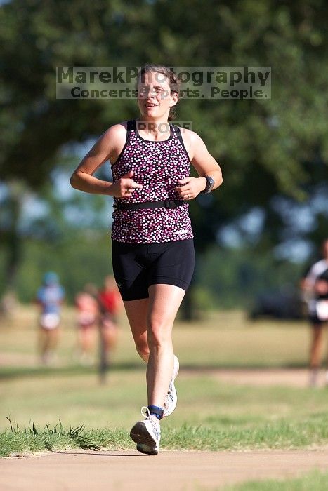 Beth Marek (bib #81) of Austin placed 4 in her age group (F 30-34) with an overall time of 01:46:51 at The Howdy Du duathlon in Berry Springs Park, Georgetown, Sunday July 6, 2008.

Filename: SRM_20080706_0855280.jpg
Aperture: f/4.0
Shutter Speed: 1/500
Body: Canon EOS 20D
Lens: Canon EF 300mm f/2.8 L IS