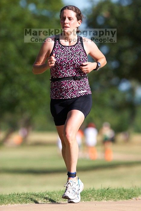 Beth Marek (bib #81) of Austin placed 4 in her age group (F 30-34) with an overall time of 01:46:51 at The Howdy Du duathlon in Berry Springs Park, Georgetown, Sunday July 6, 2008.

Filename: SRM_20080706_0855301.jpg
Aperture: f/4.0
Shutter Speed: 1/500
Body: Canon EOS 20D
Lens: Canon EF 300mm f/2.8 L IS
