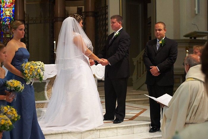 Emily Marek and James Oyan's wedding ceremony at the Cathedral of the Sacred Heart, Saturday, July 12, 2008.

Filename: SRM_20080712_0829300.jpg
Aperture: f/4.0
Shutter Speed: 1/50
Body: Canon EOS-1D Mark II
Lens: Canon EF 50mm f/1.8 II