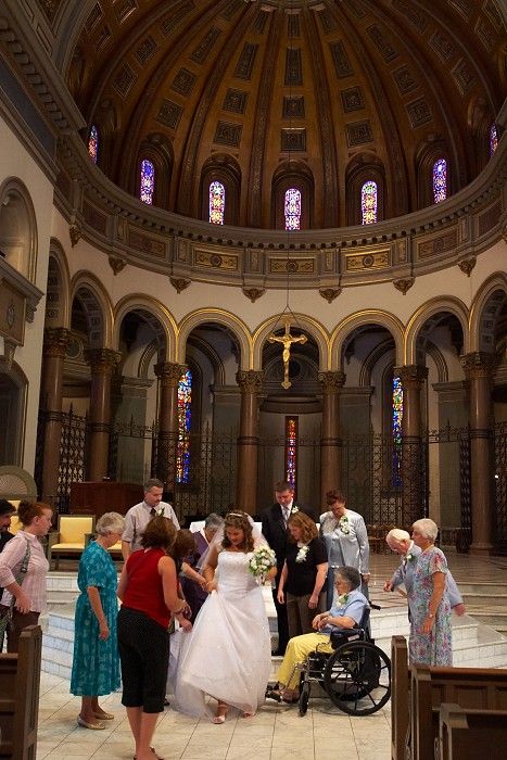 Emily Marek and James Oyan's wedding ceremony at the Cathedral of the Sacred Heart, Saturday, July 12, 2008.

Filename: SRM_20080712_0918303.jpg
Aperture: f/4.5
Shutter Speed: 1/30
Body: Canon EOS-1D Mark II
Lens: Canon EF 16-35mm f/2.8 L