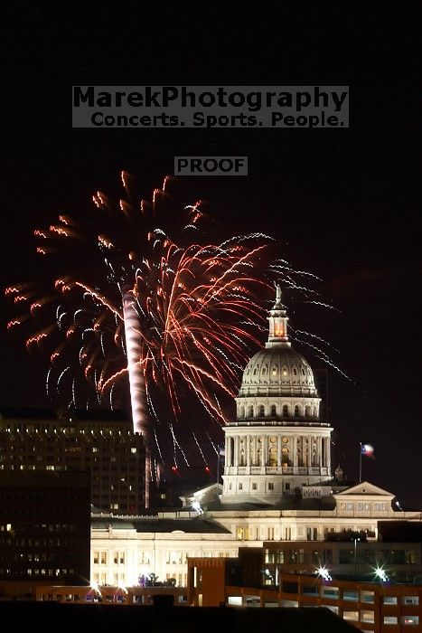 Austin Independence Day fireworks with the Capitol building, as viewed from atop the Manor Garage at The University of Texas at Austin.  The fireworks were launched from Auditorium Shores, downtown Austin, Friday, July 4, 2008.

Filename: SRM_20080704_2138161.jpg
Aperture: f/11.0
Shutter Speed: 10/1
Body: Canon EOS 20D
Lens: Canon EF 80-200mm f/2.8 L