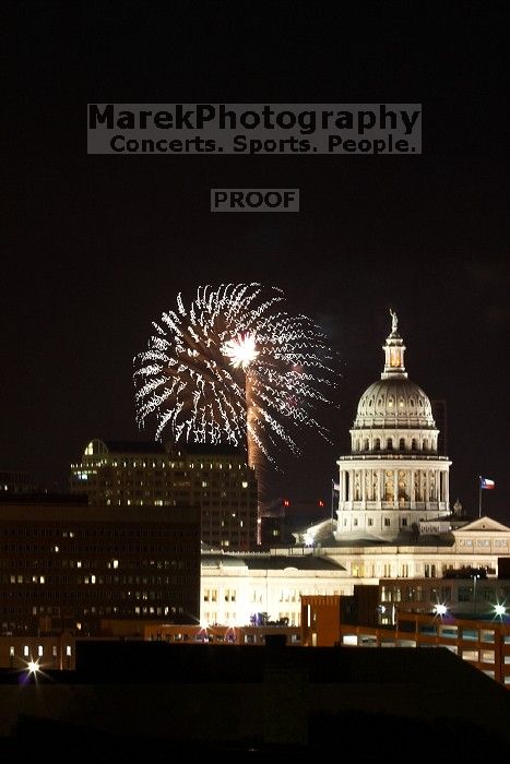 Austin Independence Day fireworks with the Capitol building, as viewed from atop the Manor Garage at The University of Texas at Austin.  The fireworks were launched from Auditorium Shores, downtown Austin, Friday, July 4, 2008.

Filename: SRM_20080704_2141445.jpg
Aperture: f/11.0
Shutter Speed: 6/1
Body: Canon EOS 20D
Lens: Canon EF 80-200mm f/2.8 L
