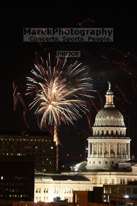 Austin Independence Day fireworks with the Capitol building, as viewed from atop the Manor Garage at The University of Texas at Austin.  The fireworks were launched from Auditorium Shores, downtown Austin, Friday, July 4, 2008.

Filename: SRM_20080704_2145469.jpg
Aperture: f/11.0
Shutter Speed: 5/1
Body: Canon EOS 20D
Lens: Canon EF 80-200mm f/2.8 L