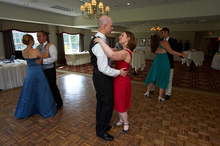 Emily Marek and James Oyan's wedding reception, held at the Richmond Country Club on Saturday, July 12, 2008.

Filename: SRM_20080712_1318125.jpg
Aperture: f/7.1
Shutter Speed: 1/80
Body: Canon EOS-1D Mark II
Lens: Canon EF 16-35mm f/2.8 L