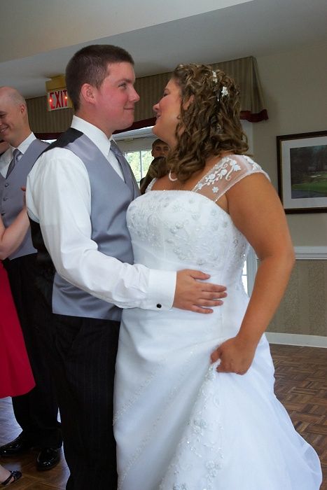 Emily Marek and James Oyan's wedding reception, held at the Richmond Country Club on Saturday, July 12, 2008.

Filename: SRM_20080712_1324062.jpg
Aperture: f/8.0
Shutter Speed: 1/80
Body: Canon EOS-1D Mark II
Lens: Canon EF 16-35mm f/2.8 L