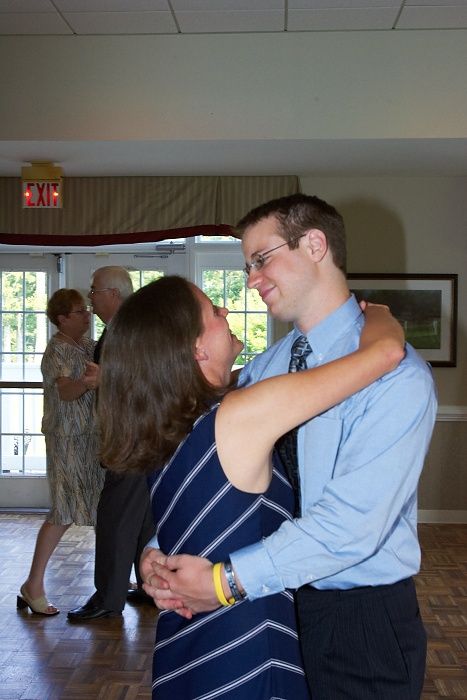 Emily Marek and James Oyan's wedding reception, held at the Richmond Country Club on Saturday, July 12, 2008.

Filename: SRM_20080712_1353386.jpg
Aperture: f/8.0
Shutter Speed: 1/80
Body: Canon EOS-1D Mark II
Lens: Canon EF 16-35mm f/2.8 L
