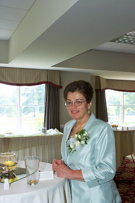 Emily Marek and James Oyan's wedding reception, held at the Richmond Country Club on Saturday, July 12, 2008.

Filename: SRM_20080712_1354064.jpg
Aperture: f/8.0
Shutter Speed: 1/80
Body: Canon EOS-1D Mark II
Lens: Canon EF 16-35mm f/2.8 L