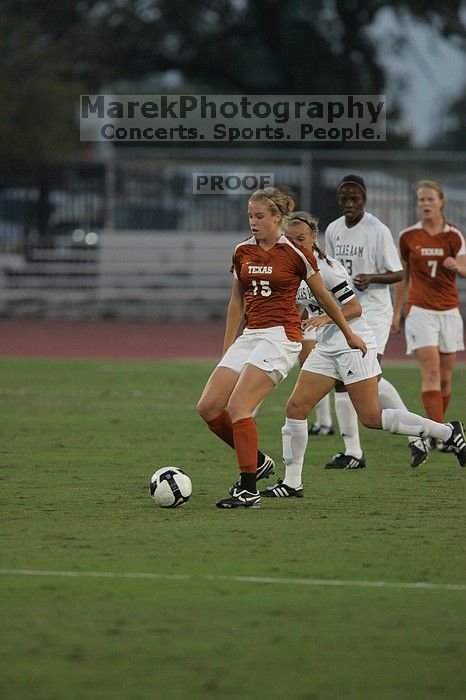 UT freshman Kylie Doniak (#15, Midfielder).  The University of Texas women's soccer team tied 0-0 against the Texas A&M Aggies Friday night, September 27, 2008.

Filename: SRM_20080926_1911225.jpg
Aperture: f/4.0
Shutter Speed: 1/800
Body: Canon EOS-1D Mark II
Lens: Canon EF 300mm f/2.8 L IS
