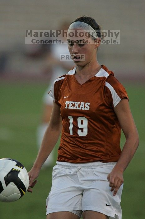 UT sophomore Erica Campanelli (#19, Defender).  The University of Texas women's soccer team tied 0-0 against the Texas A&M Aggies Friday night, September 27, 2008.

Filename: SRM_20080926_1912546.jpg
Aperture: f/4.0
Shutter Speed: 1/800
Body: Canon EOS-1D Mark II
Lens: Canon EF 300mm f/2.8 L IS