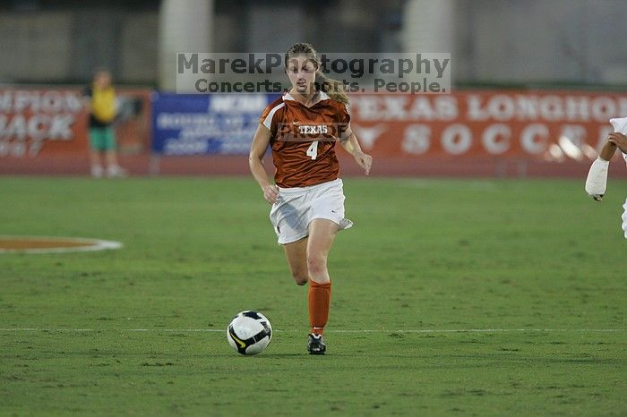 UT senior Jill Gilbeau (#4, Defender and Midfielder).  The University of Texas women's soccer team tied 0-0 against the Texas A&M Aggies Friday night, September 27, 2008.

Filename: SRM_20080926_1922204.jpg
Aperture: f/4.0
Shutter Speed: 1/400
Body: Canon EOS-1D Mark II
Lens: Canon EF 300mm f/2.8 L IS
