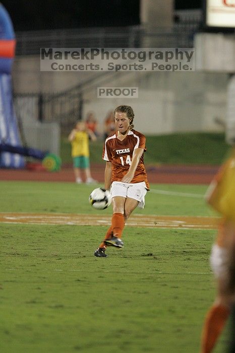 UT senior Kasey Moore (#14, Defender) send the ball up the field.  The University of Texas women's soccer team tied 0-0 against the Texas A&M Aggies Friday night, September 27, 2008.

Filename: SRM_20080926_1936244.jpg
Aperture: f/4.0
Shutter Speed: 1/320
Body: Canon EOS-1D Mark II
Lens: Canon EF 300mm f/2.8 L IS