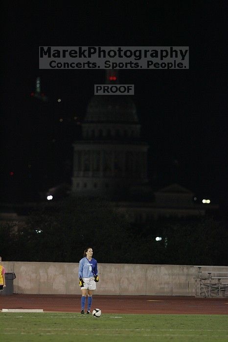 UT senior Dianna Pfenninger (#8, Goalkeeper) takes a goal kick with the capitol in the background.  The University of Texas women's soccer team tied 0-0 against the Texas A&M Aggies Friday night, September 27, 2008.

Filename: SRM_20080926_2050145.jpg
Aperture: f/2.8
Shutter Speed: 1/500
Body: Canon EOS-1D Mark II
Lens: Canon EF 300mm f/2.8 L IS