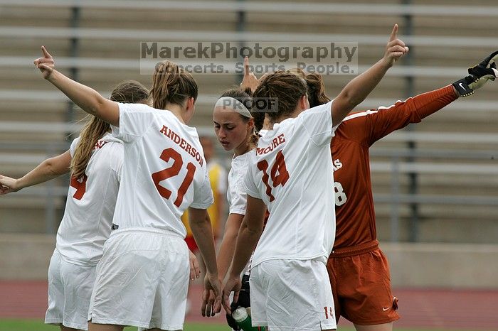UT senior Jill Gilbeau (#4, Defender and Midfielder), UT junior Emily Anderson (#21, Forward), UT senior Kasey Moore (#14, Defender), UT senior Dianna Pfenninger (#8, Goalkeeper), and UT sophomore Erica Campanelli (#19, Defender) get ready to start the game.  The University of Texas women's soccer team won 2-1 against the Iowa State Cyclones Sunday afternoon, October 5, 2008.

Filename: SRM_20081005_11573269.jpg
Aperture: f/8.0
Shutter Speed: 1/1000
Body: Canon EOS-1D Mark II
Lens: Canon EF 300mm f/2.8 L IS