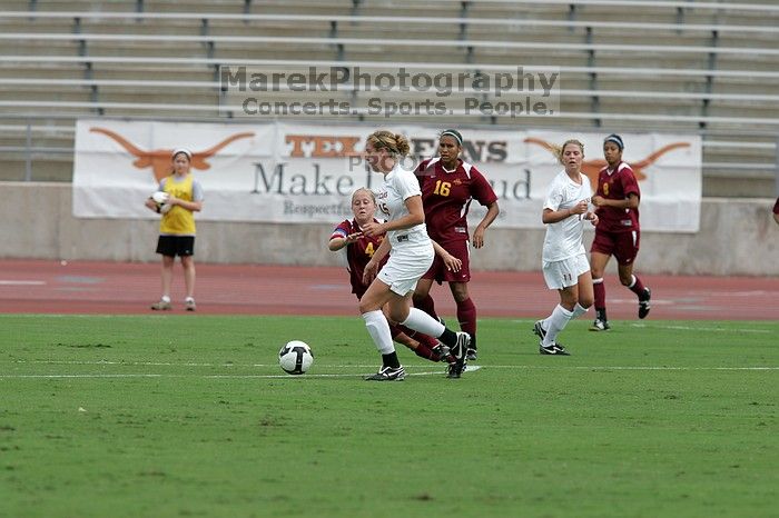 UT freshman Kylie Doniak (#15, Midfielder).  The University of Texas women's soccer team won 2-1 against the Iowa State Cyclones Sunday afternoon, October 5, 2008.

Filename: SRM_20081005_12073603.jpg
Aperture: f/5.6
Shutter Speed: 1/1600
Body: Canon EOS-1D Mark II
Lens: Canon EF 300mm f/2.8 L IS