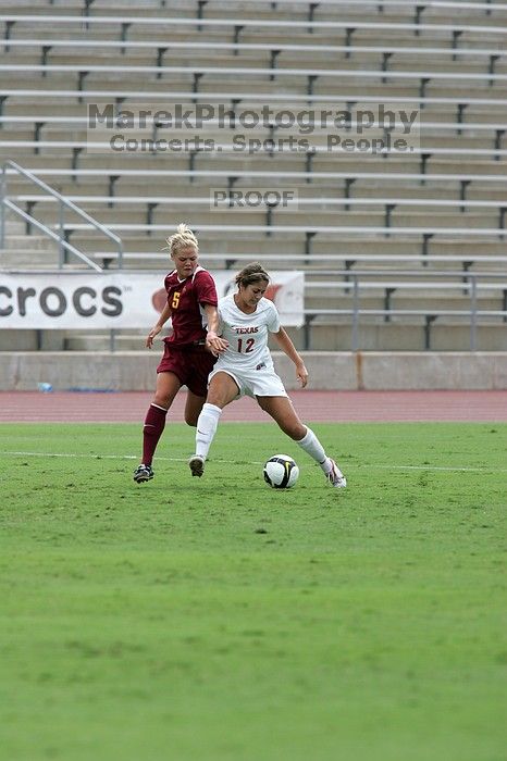UT sophomore Alisha Ortiz (#12, Forward).  The University of Texas women's soccer team won 2-1 against the Iowa State Cyclones Sunday afternoon, October 5, 2008.

Filename: SRM_20081005_12115858.jpg
Aperture: f/5.6
Shutter Speed: 1/1600
Body: Canon EOS-1D Mark II
Lens: Canon EF 300mm f/2.8 L IS