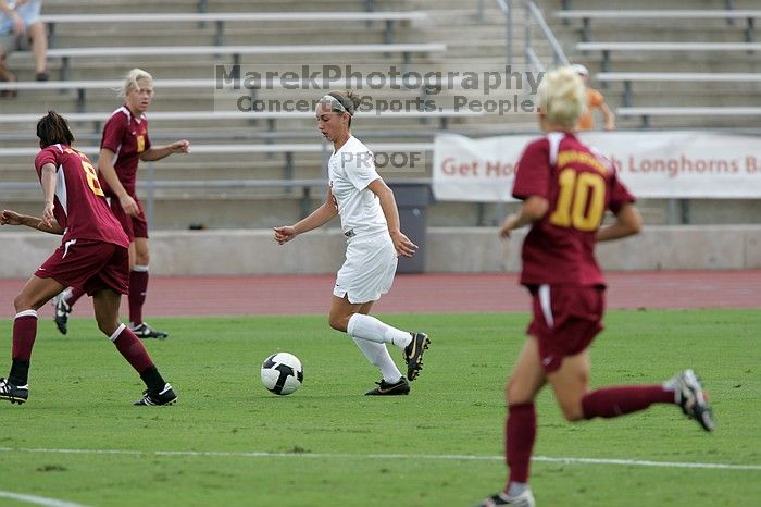 UT sophomore Erica Campanelli (#19, Defender).  The University of Texas women's soccer team won 2-1 against the Iowa State Cyclones Sunday afternoon, October 5, 2008.

Filename: SRM_20081005_12223824.jpg
Aperture: f/5.0
Shutter Speed: 1/1600
Body: Canon EOS-1D Mark II
Lens: Canon EF 300mm f/2.8 L IS
