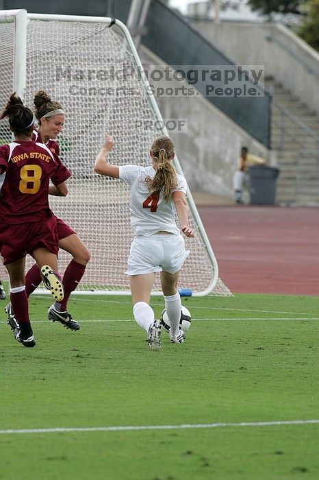 UT senior Jill Gilbeau (#4, Defender and Midfielder) makes a drive and then shot on goal in the second half.  The University of Texas women's soccer team won 2-1 against the Iowa State Cyclones Sunday afternoon, October 5, 2008.

Filename: SRM_20081005_13070486.jpg
Aperture: f/5.6
Shutter Speed: 1/1250
Body: Canon EOS-1D Mark II
Lens: Canon EF 300mm f/2.8 L IS