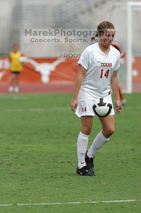 UT senior Kasey Moore (#14, Defender) in the second half.  The University of Texas women's soccer team won 2-1 against the Iowa State Cyclones Sunday afternoon, October 5, 2008.

Filename: SRM_20081005_13092231.jpg
Aperture: f/5.6
Shutter Speed: 1/2000
Body: Canon EOS-1D Mark II
Lens: Canon EF 300mm f/2.8 L IS