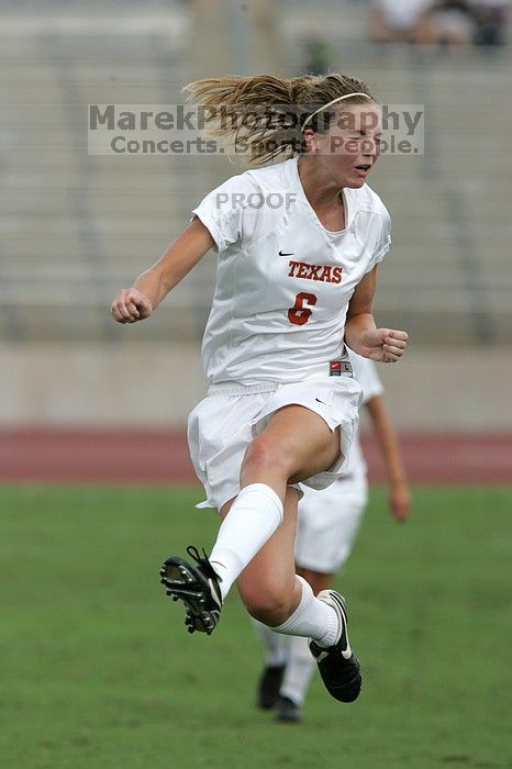 UT freshman Lucy Keith (#6, Midfielder) in mid-jump in the second half.  The University of Texas women's soccer team won 2-1 against the Iowa State Cyclones Sunday afternoon, October 5, 2008.

Filename: SRM_20081005_13173041.jpg
Aperture: f/5.6
Shutter Speed: 1/1600
Body: Canon EOS-1D Mark II
Lens: Canon EF 300mm f/2.8 L IS