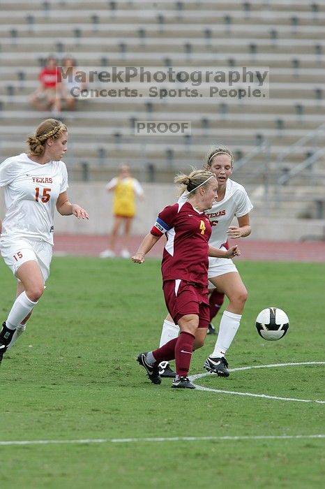 UT freshman Lucy Keith (#6, Midfielder) gets beat as UT freshman Kylie Doniak (#15, Midfielder) watches in the second half.  The University of Texas women's soccer team won 2-1 against the Iowa State Cyclones Sunday afternoon, October 5, 2008.

Filename: SRM_20081005_13265248.jpg
Aperture: f/5.6
Shutter Speed: 1/1250
Body: Canon EOS-1D Mark II
Lens: Canon EF 300mm f/2.8 L IS