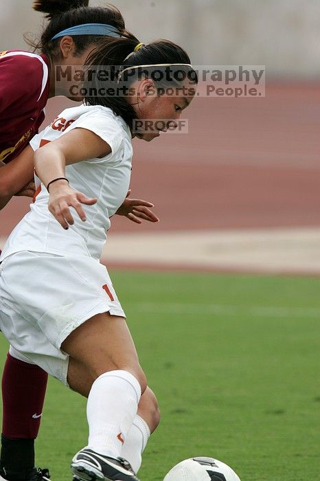 UT freshman Amanda Lisberger (#13, Midfielder) in the second half.  The University of Texas women's soccer team won 2-1 against the Iowa State Cyclones Sunday afternoon, October 5, 2008.

Filename: SRM_20081005_13311225.jpg
Aperture: f/5.6
Shutter Speed: 1/1250
Body: Canon EOS-1D Mark II
Lens: Canon EF 300mm f/2.8 L IS