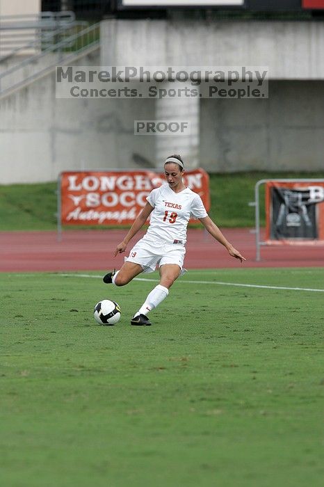 UT sophomore Erica Campanelli (#19, Defender) crosses the ball in the second half.  The University of Texas women's soccer team won 2-1 against the Iowa State Cyclones Sunday afternoon, October 5, 2008.

Filename: SRM_20081005_13314636.jpg
Aperture: f/5.6
Shutter Speed: 1/1600
Body: Canon EOS-1D Mark II
Lens: Canon EF 300mm f/2.8 L IS
