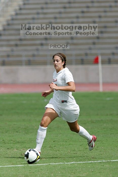 UT sophomore Alisha Ortiz (#12, Forward) in the second half.  The University of Texas women's soccer team won 2-1 against the Iowa State Cyclones Sunday afternoon, October 5, 2008.

Filename: SRM_20081005_13424464.jpg
Aperture: f/5.6
Shutter Speed: 1/2500
Body: Canon EOS-1D Mark II
Lens: Canon EF 300mm f/2.8 L IS
