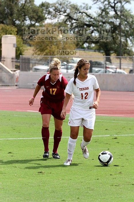UT sophomore Alisha Ortiz (#12, Forward) in the second half.  The University of Texas women's soccer team won 2-1 against the Iowa State Cyclones Sunday afternoon, October 5, 2008.

Filename: SRM_20081005_13431637.jpg
Aperture: f/5.0
Shutter Speed: 1/2000
Body: Canon EOS 20D
Lens: Canon EF 80-200mm f/2.8 L