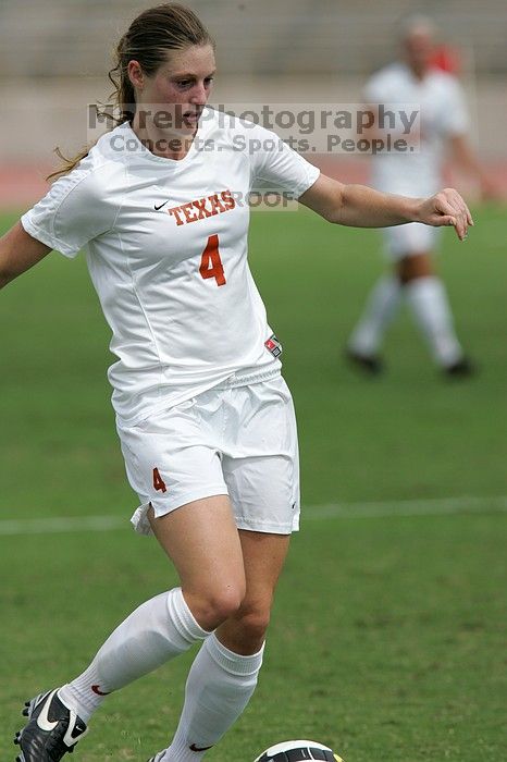 UT senior Jill Gilbeau (#4, Defender and Midfielder) in the second half.  The University of Texas women's soccer team won 2-1 against the Iowa State Cyclones Sunday afternoon, October 5, 2008.

Filename: SRM_20081005_13454617.jpg
Aperture: f/5.6
Shutter Speed: 1/2500
Body: Canon EOS-1D Mark II
Lens: Canon EF 300mm f/2.8 L IS