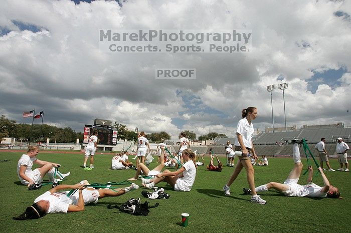 The team stretches after the match.  The University of Texas women's soccer team won 2-1 against the Iowa State Cyclones Sunday afternoon, October 5, 2008.

Filename: SRM_20081005_13525847.jpg
Aperture: f/11.0
Shutter Speed: 1/320
Body: Canon EOS-1D Mark II
Lens: Canon EF 16-35mm f/2.8 L
