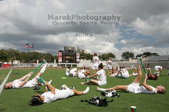 The team stretches after the match.  The University of Texas women's soccer team won 2-1 against the Iowa State Cyclones Sunday afternoon, October 5, 2008.

Filename: SRM_20081005_13531448.jpg
Aperture: f/11.0
Shutter Speed: 1/250
Body: Canon EOS-1D Mark II
Lens: Canon EF 16-35mm f/2.8 L