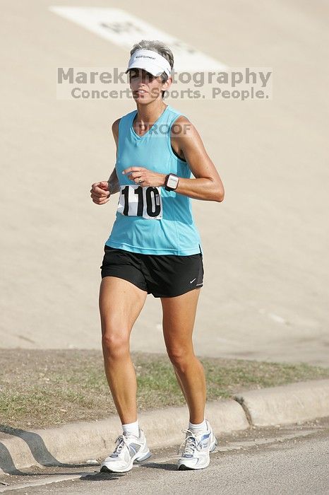 Karen Pearce placed second in her age groun at the Army Dillo half-marathon and 32K race.

Filename: SRM_20080921_0943561.jpg
Aperture: f/4.0
Shutter Speed: 1/2000
Body: Canon EOS-1D Mark II
Lens: Canon EF 300mm f/2.8 L IS