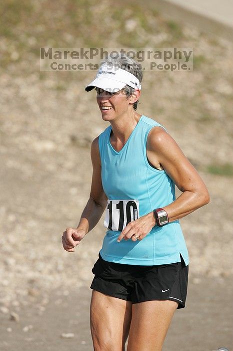 Karen Pearce placed second in her age groun at the Army Dillo half-marathon and 32K race.

Filename: SRM_20080921_0943583.jpg
Aperture: f/4.0
Shutter Speed: 1/2000
Body: Canon EOS-1D Mark II
Lens: Canon EF 300mm f/2.8 L IS