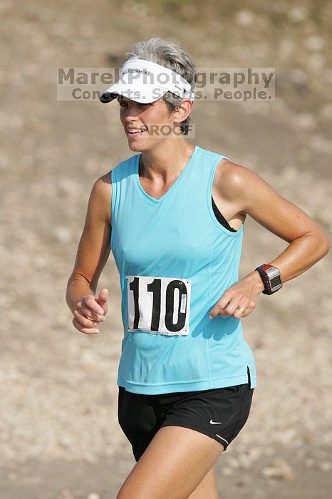 Karen Pearce placed second in her age groun at the Army Dillo half-marathon and 32K race.
Filename: SRM_20080921_0943586.jpg
Aperture: f/4.0
Shutter Speed: 1/2000
Body: Canon EOS-1D Mark II
Lens: Canon EF 300mm f/2.8 L IS