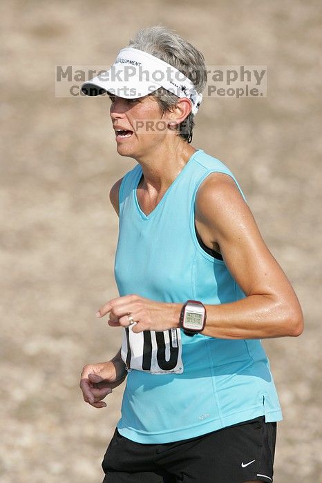 Karen Pearce placed second in her age groun at the Army Dillo half-marathon and 32K race.

Filename: SRM_20080921_0944009.jpg
Aperture: f/4.0
Shutter Speed: 1/2000
Body: Canon EOS-1D Mark II
Lens: Canon EF 300mm f/2.8 L IS