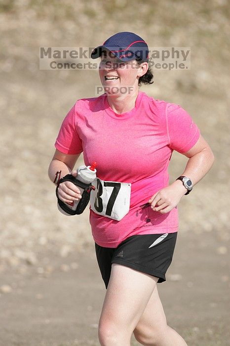 Meredith Cohen running the Army Dillo half-marathon and 32K race.

Filename: SRM_20080921_1001042.jpg
Aperture: f/4.0
Shutter Speed: 1/2000
Body: Canon EOS-1D Mark II
Lens: Canon EF 300mm f/2.8 L IS