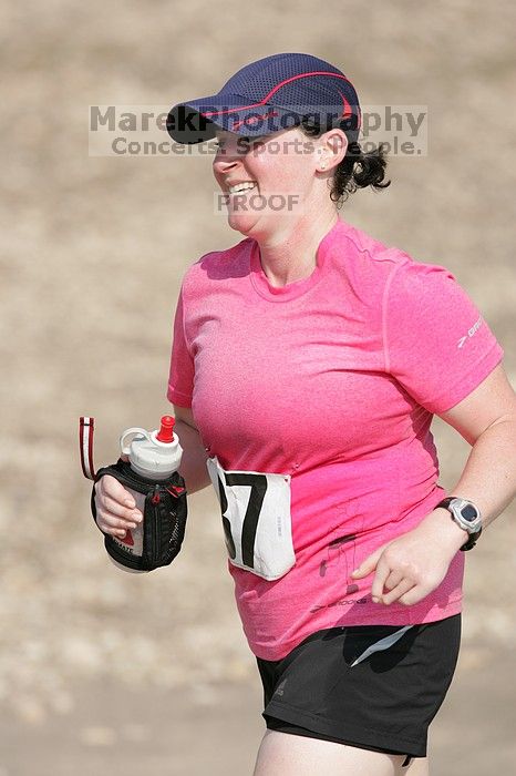 Meredith Cohen running the Army Dillo half-marathon and 32K race.

Filename: SRM_20080921_1001081.jpg
Aperture: f/4.0
Shutter Speed: 1/2000
Body: Canon EOS-1D Mark II
Lens: Canon EF 300mm f/2.8 L IS