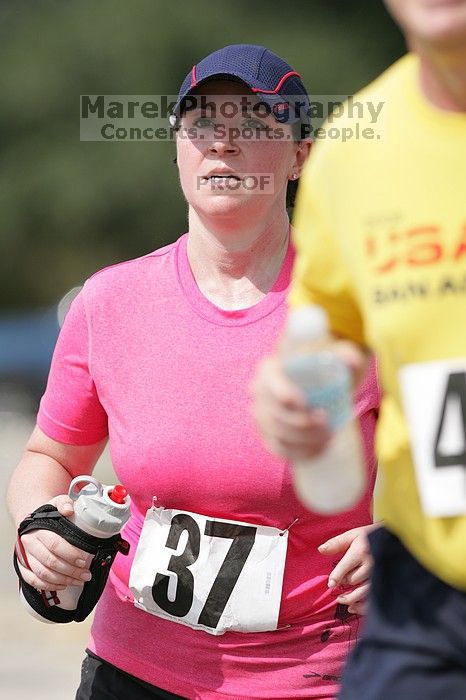 Meredith Cohen running the Army Dillo half-marathon and 32K race.

Filename: SRM_20080921_1116026.jpg
Aperture: f/4.0
Shutter Speed: 1/2000
Body: Canon EOS-1D Mark II
Lens: Canon EF 300mm f/2.8 L IS