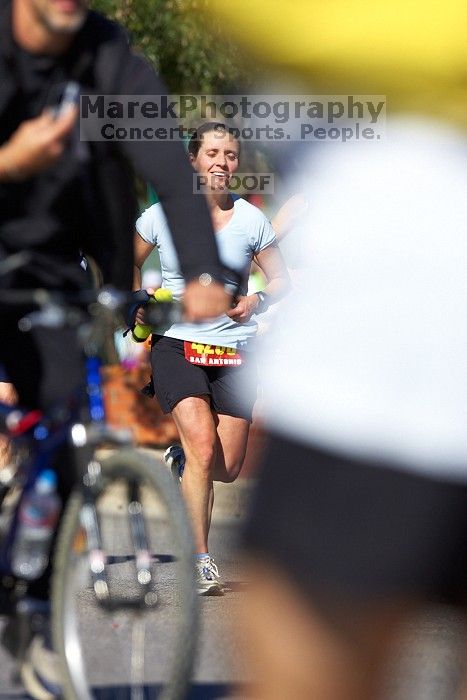 Beth Marek, bib #4236, completed the course in 3:38:21, a Boston Marathon qualifying time.  The first annual San Antonio Rock and Roll Marathon, Sunday, November 16, 2008.

Filename: SRM_20081116_11153052.jpg
Aperture: f/4.0
Shutter Speed: 1/2500
Body: Canon EOS-1D Mark II
Lens: Canon EF 300mm f/2.8 L IS