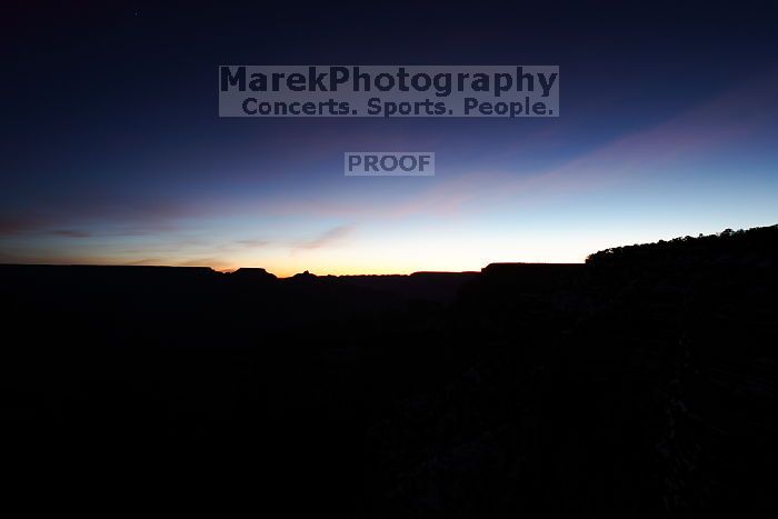 First sunrise of the new year at the south rim of the Grand Canyon, Thursday January 1, 2009.  The temperature was as low as 15 F the night before with a foot and a half of snow on the ground.  Luckily sunrise wasn't until 7:40.

Filename: SRM_20090101_06553284.JPG
Aperture: f/10.0
Shutter Speed: 30/1
Body: Canon EOS-1D Mark II
Lens: Canon EF 16-35mm f/2.8 L