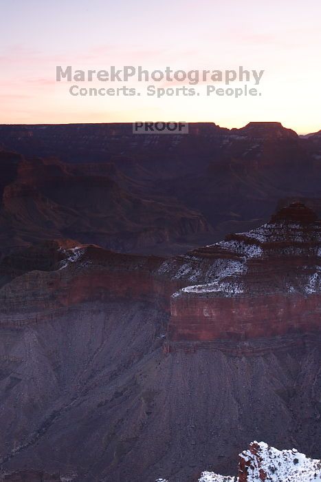 First sunrise of the new year at the south rim of the Grand Canyon, Thursday January 1, 2009.  The temperature was as low as 15 F the night before with a foot and a half of snow on the ground.  Luckily sunrise wasn't until 7:40.

Filename: SRM_20090101_07215894.JPG
Aperture: f/11.0
Shutter Speed: 13/1
Body: Canon EOS-1D Mark II
Lens: Canon EF 16-35mm f/2.8 L
