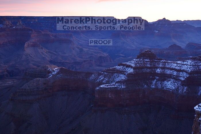 First sunrise of the new year at the south rim of the Grand Canyon, Thursday January 1, 2009.  The temperature was as low as 15 F the night before with a foot and a half of snow on the ground.  Luckily sunrise wasn't until 7:40.

Filename: SRM_20090101_07240895.JPG
Aperture: f/11.0
Shutter Speed: 4/1
Body: Canon EOS-1D Mark II
Lens: Canon EF 16-35mm f/2.8 L