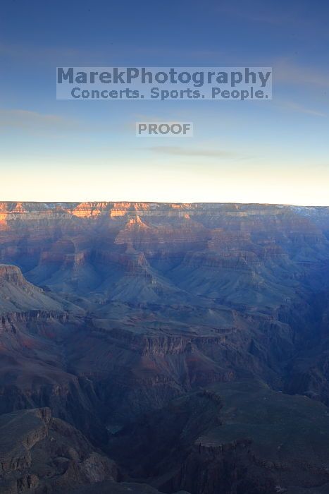 First sunrise of the new year at the south rim of the Grand Canyon, Thursday January 1, 2009.  The temperature was as low as 15 F the night before with a foot and a half of snow on the ground.  Luckily sunrise wasn't until 7:40.

Filename: SRM_20090101_07432212.JPG
Aperture: f/16.0
Shutter Speed: 13/10
Body: Canon EOS-1D Mark II
Lens: Canon EF 16-35mm f/2.8 L