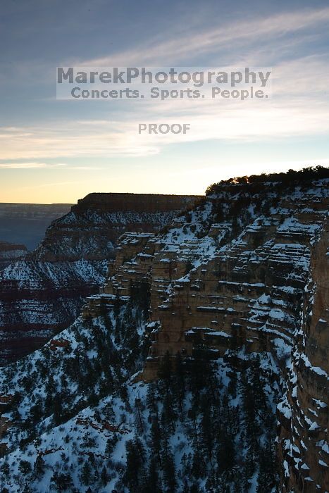 First sunrise of the new year at the south rim of the Grand Canyon, Thursday January 1, 2009.  The temperature was as low as 15 F the night before with a foot and a half of snow on the ground.  Luckily sunrise wasn't until 7:40.

Filename: SRM_20090101_07502620.JPG
Aperture: f/16.0
Shutter Speed: 6/10
Body: Canon EOS-1D Mark II
Lens: Canon EF 16-35mm f/2.8 L