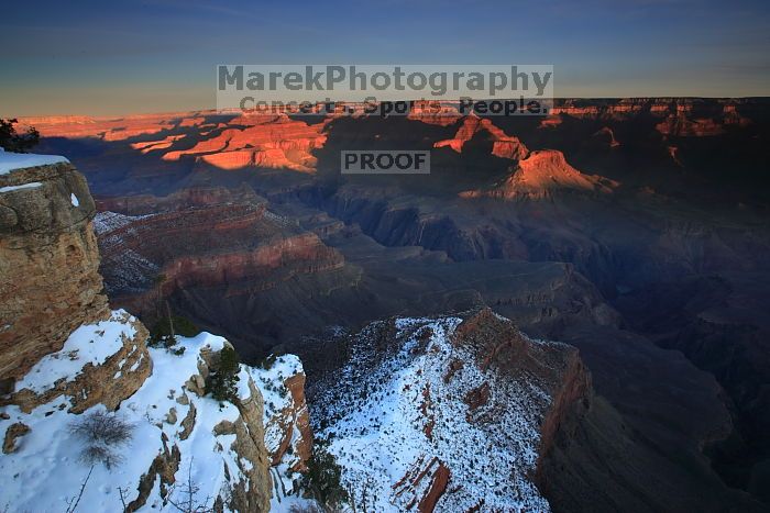 First sunrise of the new year at the south rim of the Grand Canyon, Thursday January 1, 2009.  The temperature was as low as 15 F the night before with a foot and a half of snow on the ground.  Luckily sunrise wasn't until 7:40.

Filename: SRM_20090101_07541323.JPG
Aperture: f/16.0
Shutter Speed: 1/1
Body: Canon EOS-1D Mark II
Lens: Canon EF 16-35mm f/2.8 L